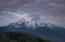 Snow covered mountain peaks of Watzmann at Berchtesgaden with clouds during sunrise, Bavaria by Bastian Linder