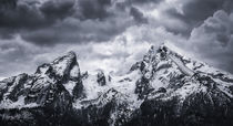 Snow covered mountain peaks of Watzmann in Berchtesgaden with dramatic sky, Bavaria by Bastian Linder