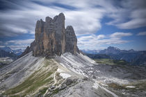 Mountain landscape of Three Peaks in the European Dolomite Alps with clouds in the sky, South Tyrol Italy by Bastian Linder