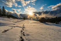 Sonnenuntergang in der verschneiten Schweiz von mindscapephotos