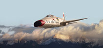 F-100 Jet Over The Snow Capped Mountains by Larry McManus