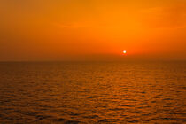 Ibiza seascape. A spectacular sunset on the sea seen from a boat in navigation  by susanna mattioda