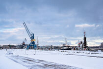 Blick über den Stadthafen in der Hansestadt Rostock im Winter von Rico Ködder