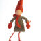 Handmade-crochet-autumn-gnome-with-red-hat-and-scarf-standing-position