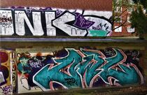Grafitti an einer Garagenwand von assy