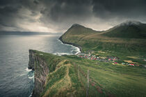 Coastal landscape with cliffs at the village of Gjogv on island Eysturoy with mountains and ocean, Faroe Islands by Bastian Linder