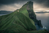 Kalsoy lighthouse with steep cliffs during sunset, Faroe Islands von Bastian Linder