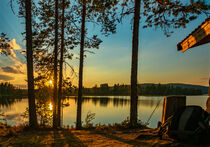 breathtaking sunset on a summer evening on a Swedish lake by Margit Kluthke