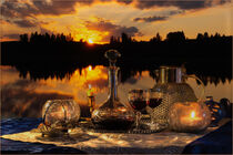 romantic candlelight dinner near by a lake with a beautiful sunset in Dalarna / Sweden by Margit Kluthke