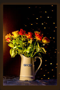 Bouquet of roses in an old cream jug against a dark background with texture and points of light.  by Margit Kluthke