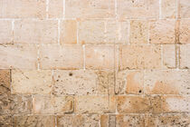 Vintage stone wall background texture, close-up by Alex Winter