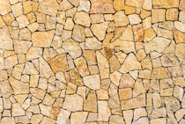 Natural light brown stone background texture von Alex Winter