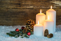 Burning christmas or advent candles by Alex Winter