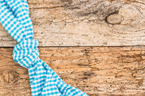Rustic texture of wooden table background , with blue checkered tablecloth, high angel view by Alex Winter