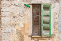 Vintage wooden window shutters and old wall by Alex Winter