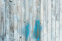 Rustic blue colored wood background texture with copy space by Alex Winter