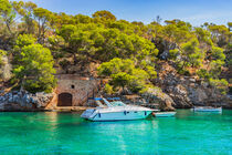 Majorca, idyllic view of anchoring yacht in beautiful bay, Spain by Alex Winter