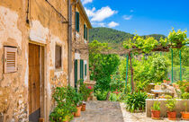 Majorca, rustic mediterranean houses with beautiful front yard and potted plants von Alex Winter
