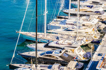 Luxury yachts boats anchored at marina by Alex Winter