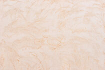 Stucco wall background texture in light beige by Alex Winter