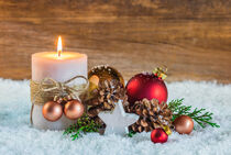 Burning candle with decoration for Advent or Christmas by Alex Winter