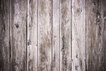 Vignette framed old gray wooden planks background by Alex Winter
