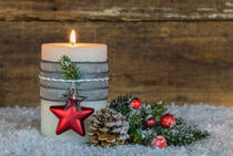 Burning candle with decoration for Advent or Christmas by Alex Winter