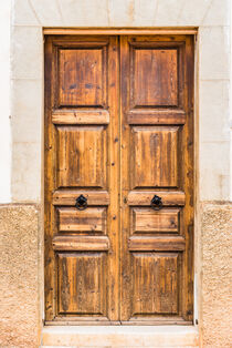 Mediterranean house, detail view of old wooden front door by Alex Winter