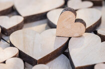 Many wooden love hearts by Alex Winter