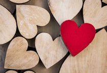 Red heart for Valentines day with many wooden love hearts by Alex Winter