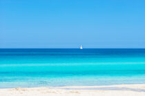 Summer sand beach with sailing yacht at the horizon by Alex Winter