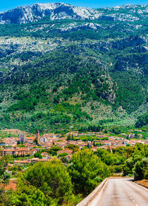 Majorca, panoramic landscape view of street to the mediterranean village of Soller  by Alex Winter