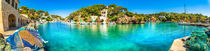 Mallorca, panoramic view of old fisher village and boats at bay coast of Majorca island von Alex Winter