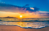 Break of dawn scene on the beach with soft sea water wave on sand von Alex Winter