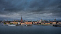 Skyline of Stockholm at night with Riddarholmskyrkan church and Stadshus on Gamla Stan old town island in Sweden by Bastian Linder