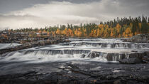 Trappstegsforsen waterfall in autumn along the Wilderness Road in Lapland in Sweden by Bastian Linder