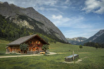Alm cabin in front of mountains of Karwendel in the valley at Ahornboden in Austria Tyrol by Bastian Linder