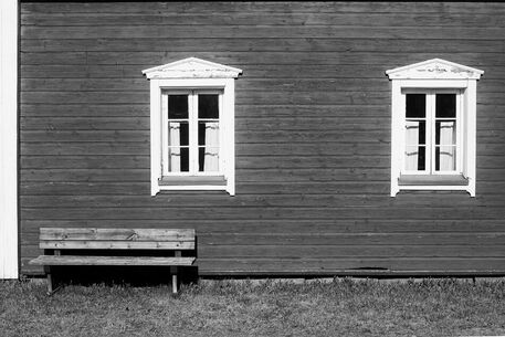 Two-windows-and-a-wooden-bench-2