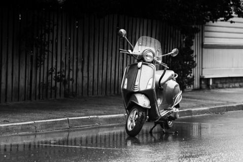 Scooter-parked-in-the-rain-2