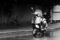 Scooter Parked In The Rain by Jukka Heinovirta