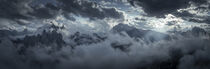 Mountain panorama with low clouds around mountain summits in Three Peaks Nature Reserve in the Dolomite Alps in South Tyrol von Bastian Linder