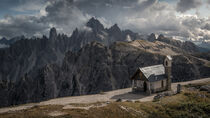 Chapel Cappella degli Alpini in front of mountain panorama in Dolomite Alps at Three Peaks in Italy by Bastian Linder