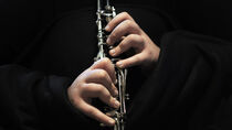 hands playing clarinet by kristynes