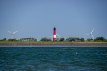 Lighthouse on the Pellworm Island by Jesus Fernandez