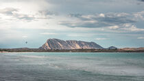 Mountain of island Tavolara in Sadinia Italy at San Teodoro sand beach with turquoise sea water by Bastian Linder