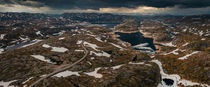 Landscape with lonesome road around Lysefjord in Rogaland with lakes and snow in Norway by Bastian Linder
