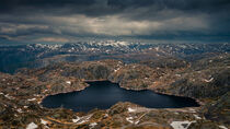 Landscape around Lysefjord in Rogaland with lakes and snow in Norway by Bastian Linder