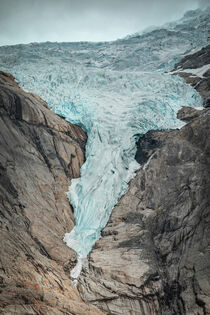 Briksdalsbreen glacier ice in the mountains of Jostedalsbreen national park in Norway by Bastian Linder