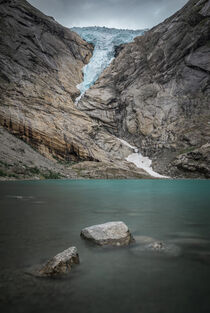 Briksdalsbreen glacier ice and glacier lake in the mountains of Jostedalsbreen national park in Norway von Bastian Linder