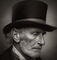 Dall-star-e-2023-03-06-11-dot-09-dot-10-victorian-era-portrait-of-an-old-man-wearing-a-hat-photorealisticcror2res-pebw-hollywoodgamourres